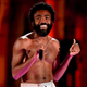 Illustration for article titled Donald Glover showed up to work for The Lion King wearing the wrong Disney character on his shirt